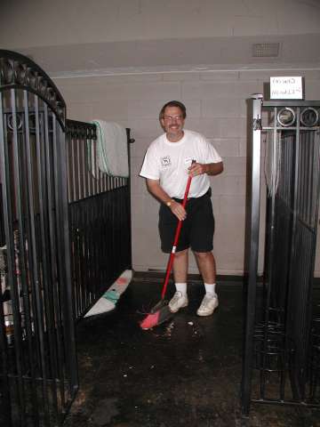 Hey, he's sweeping the kibble into my kennel!